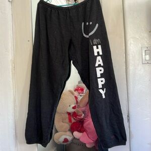 Sweat pants with signs of live on them. Super cute.
